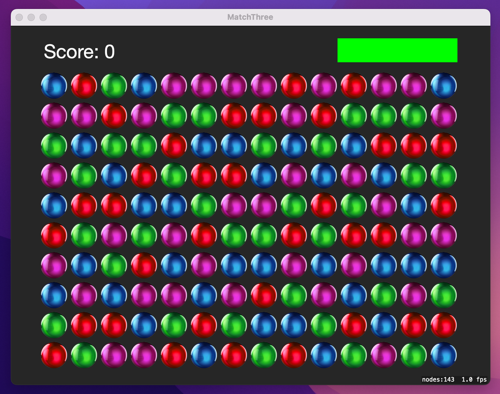 A grid of colorful balls, above which is 'Score: 0' and a green bar.